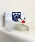 Bar of soap with a box labeled 'Herc's Soap' on a white background
