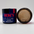Herc's A La Creme whipped tallow balm jar with open lid on a white background