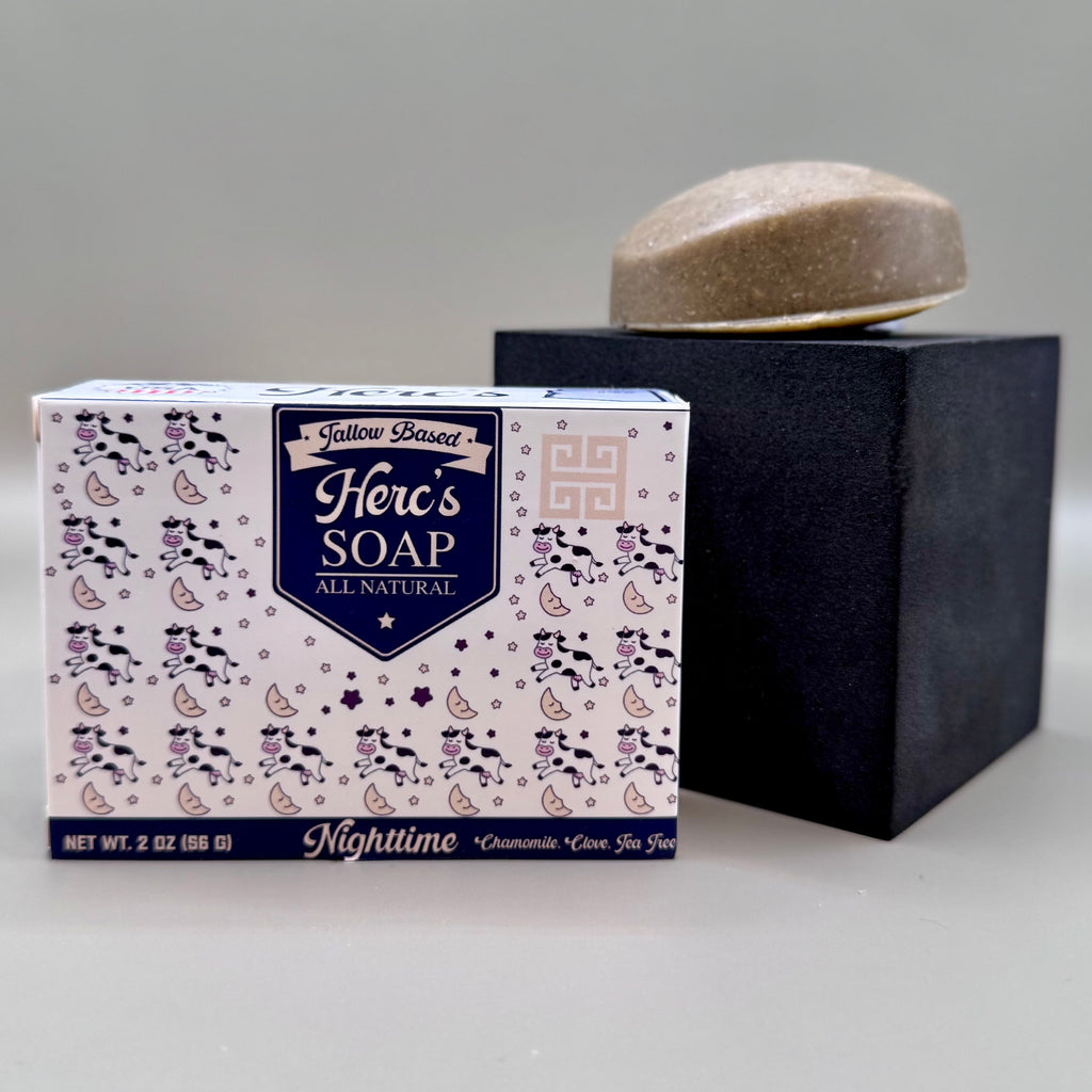 Box of 'Hero's Soap' with a bar of soap on a gray background